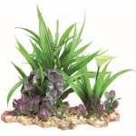 PLANTE EN PLASTIQUE DANS UN LIT DE SABLE 18 X 30 CM